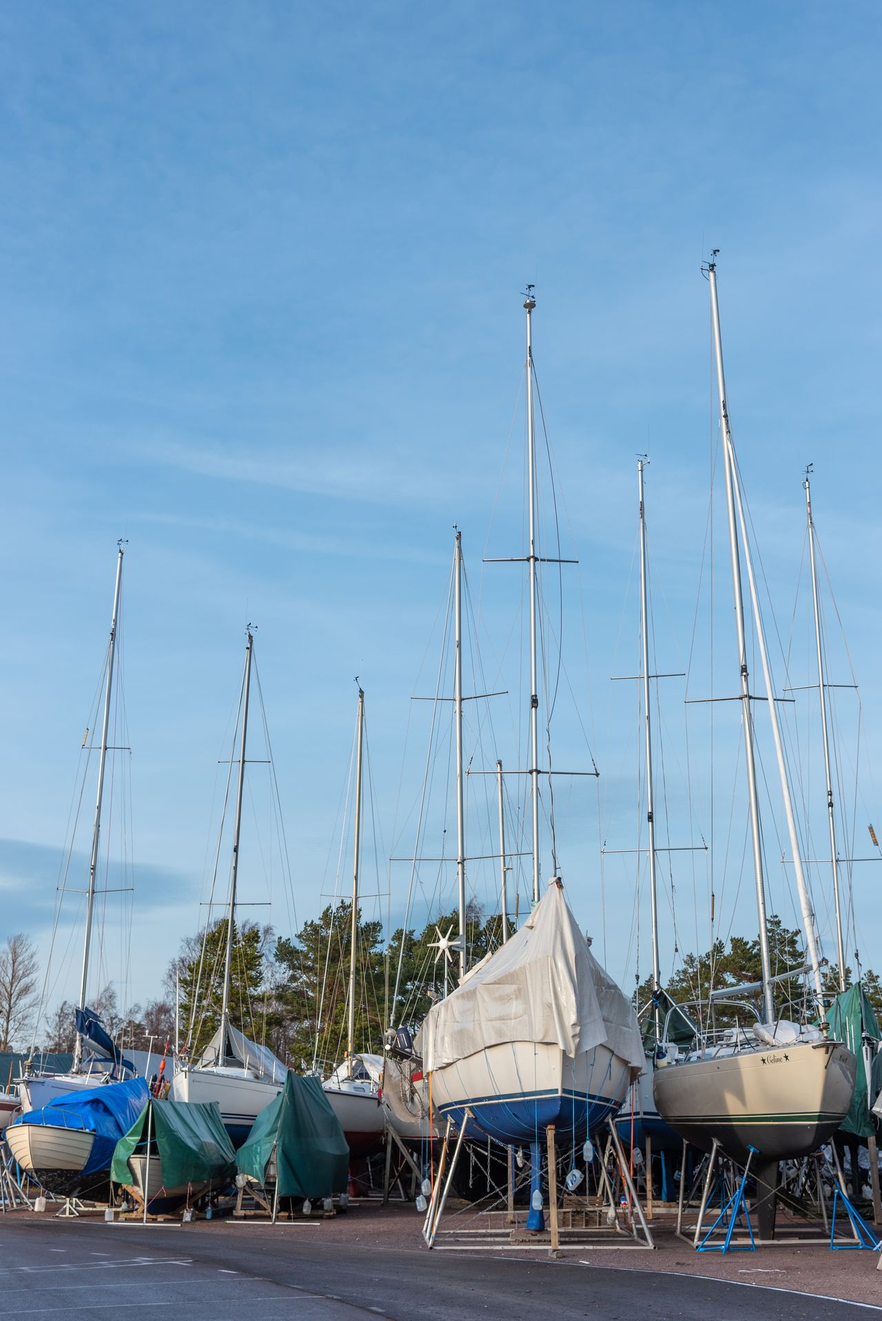 Boats hauled out and standing on cradles in a boatyard